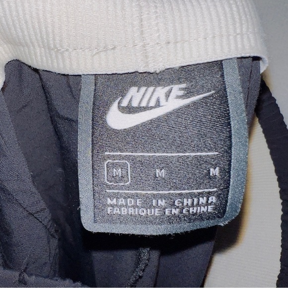 Nike Sportswear Tech Pack Leggings Black Stirrups Pants 930581-010 - Picture 3 of 8